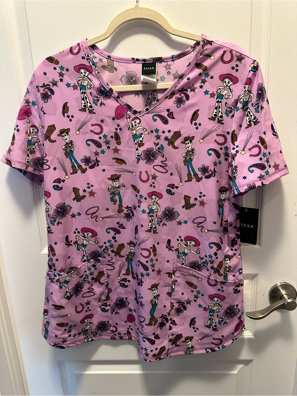 Pixar Toy Story Jessie Woody Pink Scrub Top V Neck Medical Uniform NWT